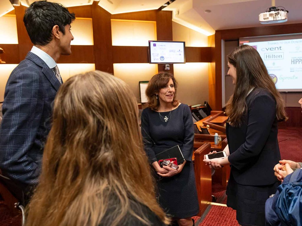 dean walsh speaking with students