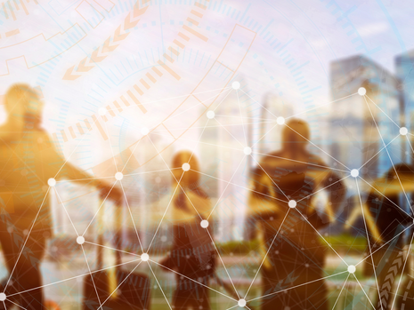 Image of professionals outside in a busy city